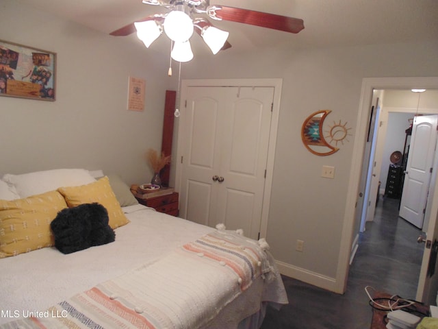 70 Tree Line Dr, Mount Pleasant, MS 38635 - bedroom featuring a closet, dark wood-style flooring, and ceiling fan