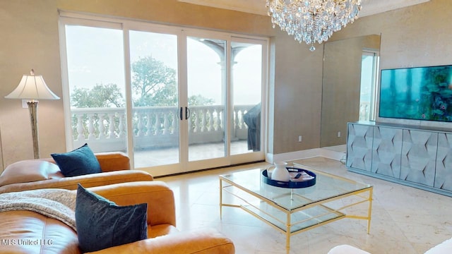 living room with ornamental molding and a notable chandelier