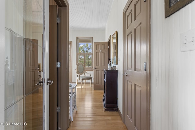 hallway featuring light wood-style flooring