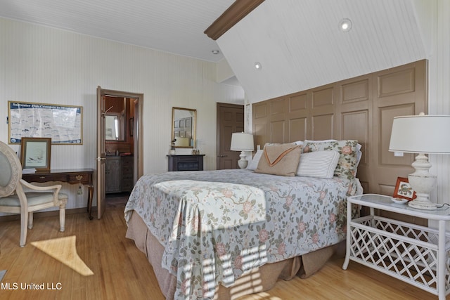bedroom with wood finished floors
