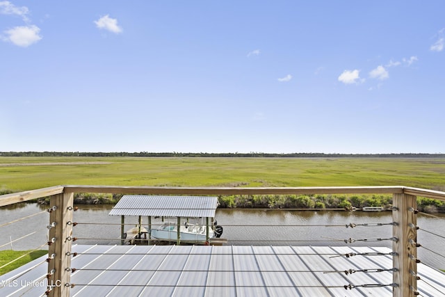 wooden terrace with a rural view