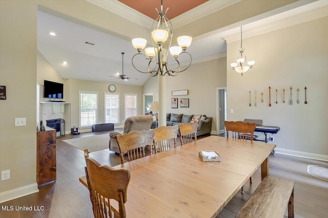 109 Bellemeade Trce, Clinton, MS 39056 - dining space with a chandelier, baseboards, ornamental molding, ceiling fan, and a fireplace
