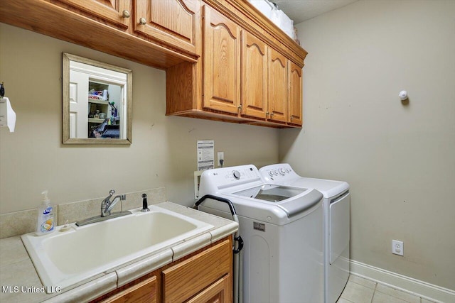 109 Bellemeade Trce, Clinton, MS 39056 - laundry room featuring cabinet space, washing machine and dryer, and light tile patterned flooring