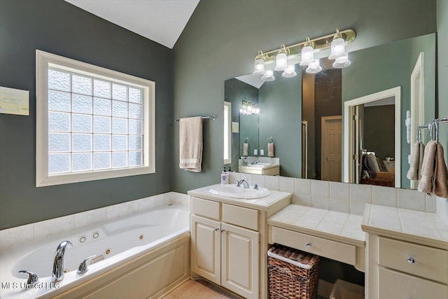 109 Bellemeade Trce, Clinton, MS 39056 - full bath featuring a whirlpool tub, vaulted ceiling, and vanity