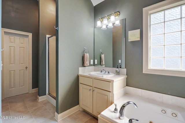 109 Bellemeade Trce, Clinton, MS 39056 - full bathroom with a whirlpool tub, tile patterned flooring, vanity, and a stall shower