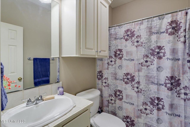 109 Bellemeade Trce, Clinton, MS 39056 - bathroom featuring toilet, vanity, and a shower with shower curtain