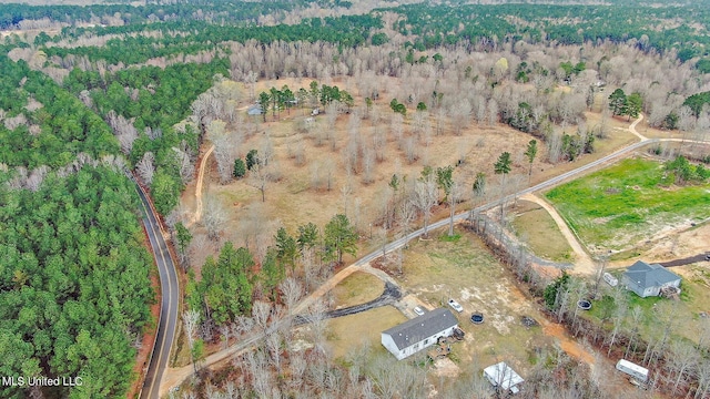 birds eye view of property featuring a rural view