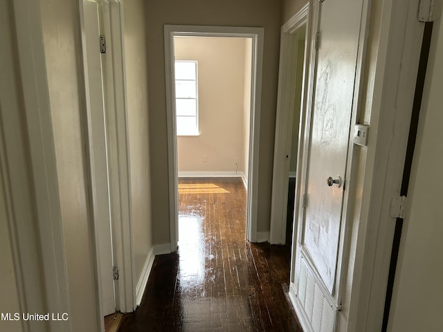 1110 Barbara Ann Dr, Jackson, MS 39204 - hallway featuring dark wood-type flooring and baseboards