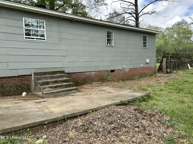 1110 Barbara Ann Dr, Jackson, MS 39204 - view of side of home featuring crawl space and fence