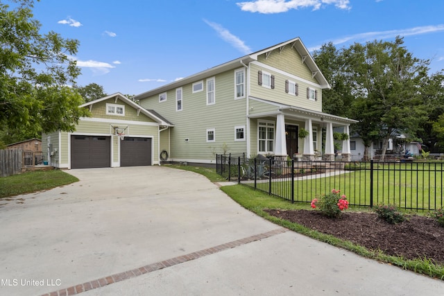 view of front of house featuring a front lawn and a garage