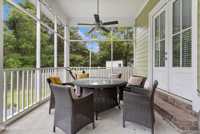 sunroom / solarium with ceiling fan