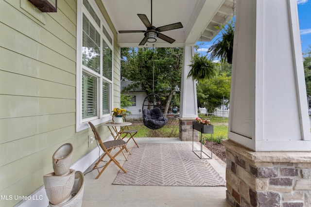 view of patio featuring covered porch and ceiling fan