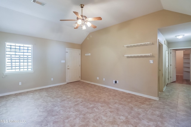 unfurnished room with vaulted ceiling and ceiling fan