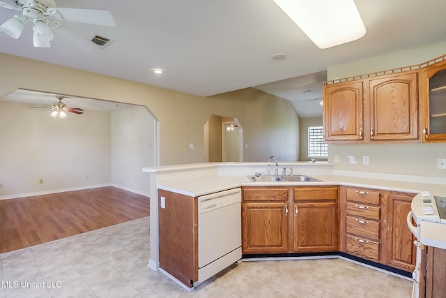 kitchen featuring kitchen peninsula, sink, range, ceiling fan, and white dishwasher