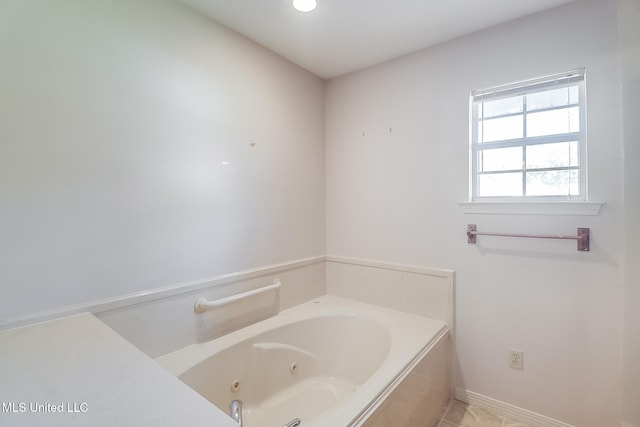 bathroom featuring a washtub