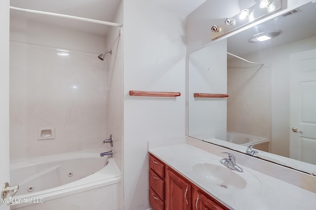 bathroom featuring shower / tub combination and vanity