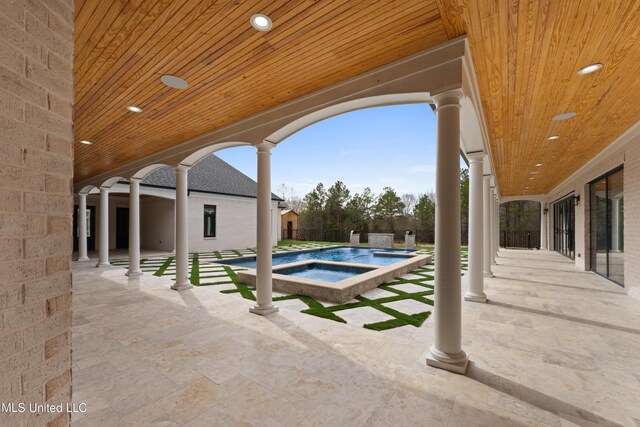 outdoor pool featuring fence private yard, a patio, and an in ground hot tub