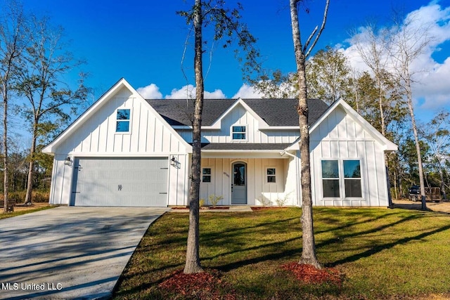 modern farmhouse style home with a front yard and a garage