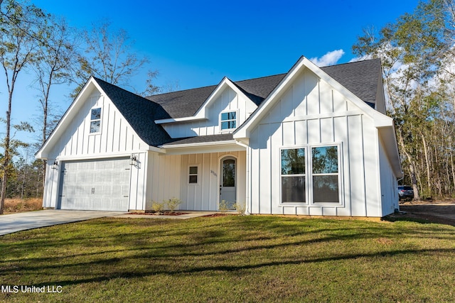 modern inspired farmhouse featuring a front yard and a garage