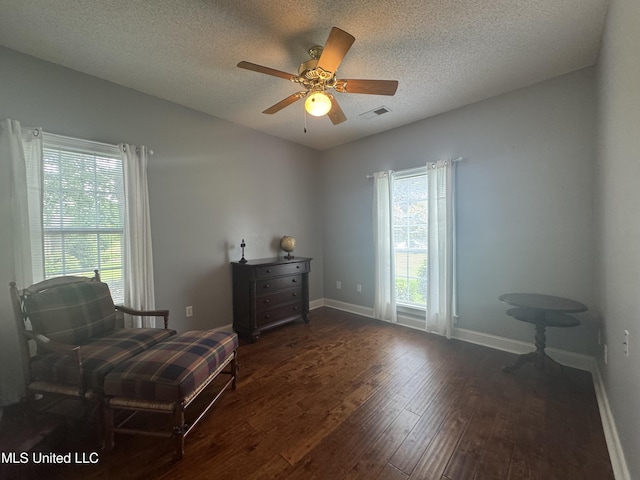 2610 Dickens Place Dr, Southaven, MS 38671 - sitting room featuring hardwood / wood-style floors, a textured ceiling, and a ceiling fan
