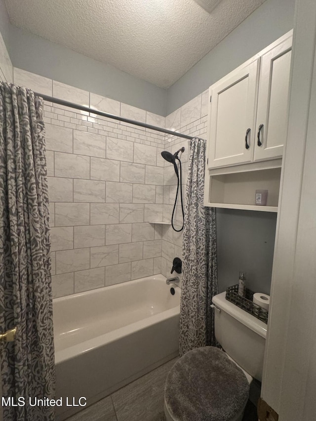 2610 Dickens Place Dr, Southaven, MS 38671 - full bathroom featuring shower / tub combo with curtain and a textured ceiling