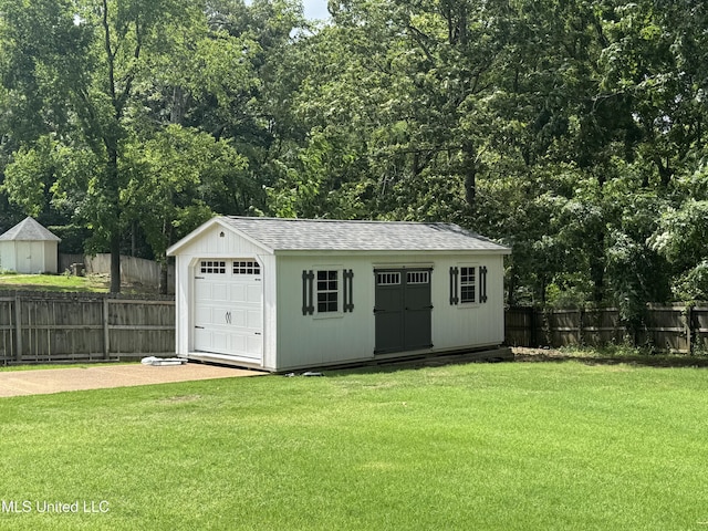 2610 Dickens Place Dr, Southaven, MS 38671 - view of shed with a fenced backyard