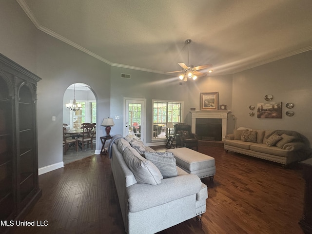 2610 Dickens Place Dr, Southaven, MS 38671 - living area featuring a fireplace, ornamental molding, a chandelier, dark wood-style floors, and a ceiling fan