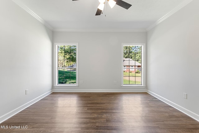 unfurnished room with ceiling fan, ornamental molding, a wealth of natural light, and dark hardwood / wood-style floors