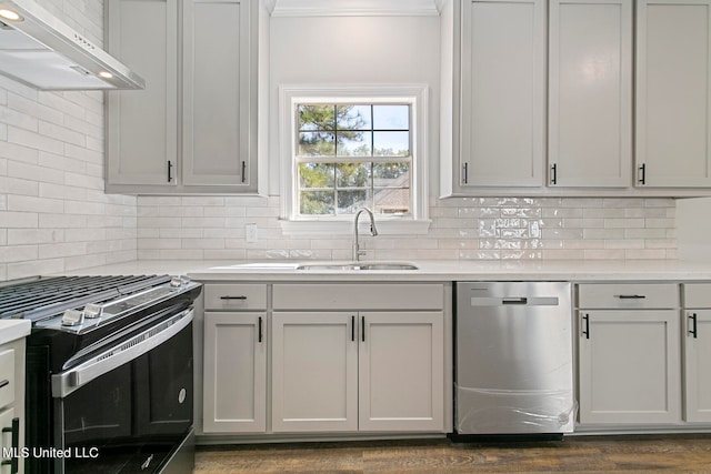 kitchen featuring exhaust hood, backsplash, dark hardwood / wood-style flooring, black gas stove, and dishwasher