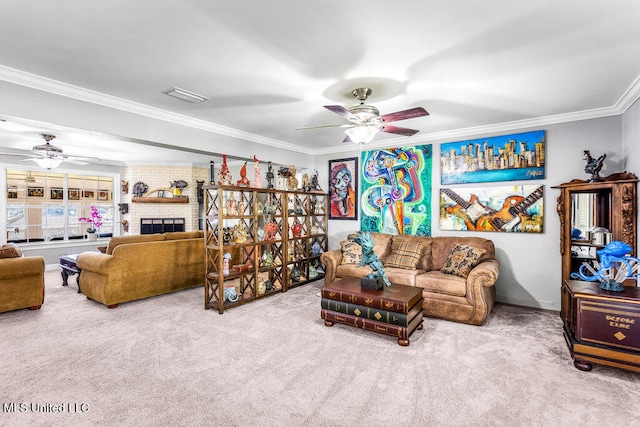 carpeted living room with ceiling fan, crown molding, and a brick fireplace