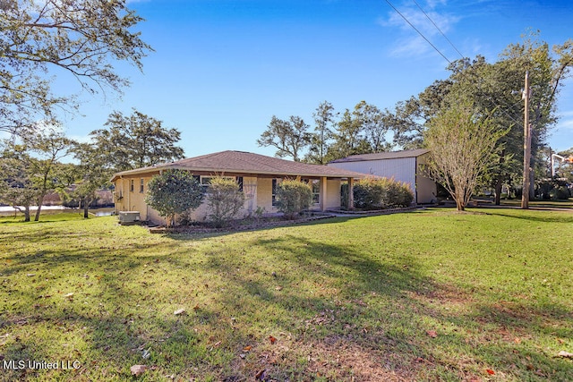 ranch-style home featuring a front yard