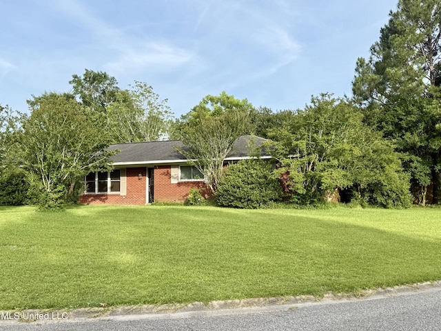 15449 Mimosa Dr, Gulfport, MS 39503 - view of front of property featuring a front yard and brick siding