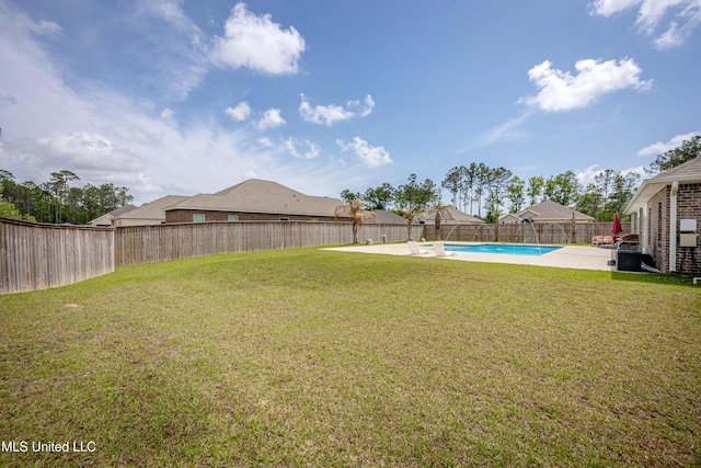 view of yard with a fenced backyard and a fenced in pool