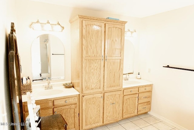 2208 Highland Dr, Gautier, MS 39553 - bathroom with double vanity and tile patterned flooring