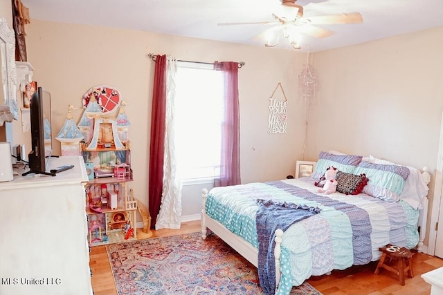 2208 Highland Dr, Gautier, MS 39553 - bedroom with light wood-style flooring and ceiling fan