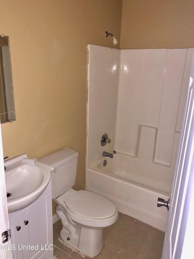 full bathroom with vanity, toilet, bathing tub / shower combination, and tile patterned flooring