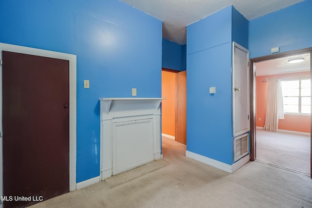 interior space with a textured ceiling