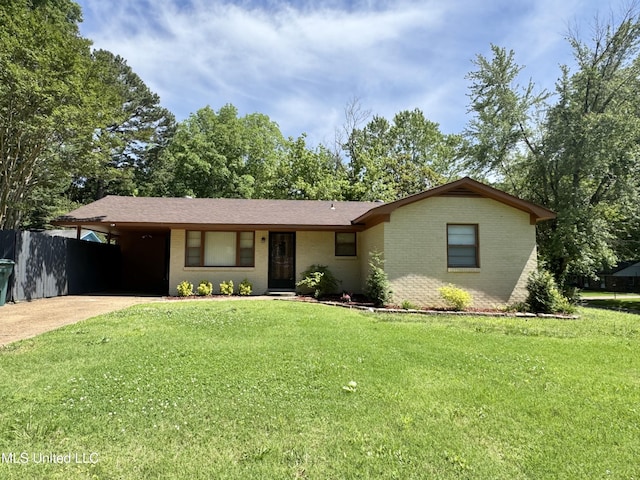 1431 Ranger Dr, Southaven, MS 38671 - ranch-style home with concrete driveway, brick siding, and an attached carport