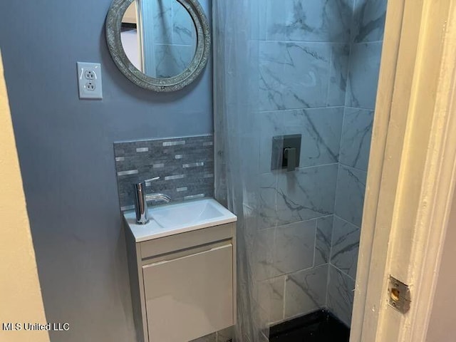 1431 Ranger Dr, Southaven, MS 38671 - bathroom with vanity and decorative backsplash