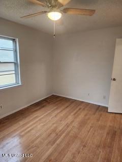 1431 Ranger Dr, Southaven, MS 38671 - spare room featuring ceiling fan, light wood finished floors, and baseboards