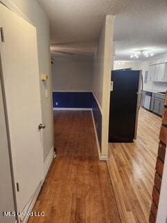 1431 Ranger Dr, Southaven, MS 38671 - corridor featuring light wood-style flooring and baseboards