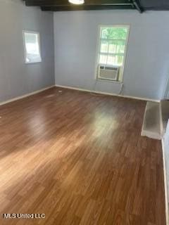 1431 Ranger Dr, Southaven, MS 38671 - spare room featuring wood finished floors, baseboards, and cooling unit