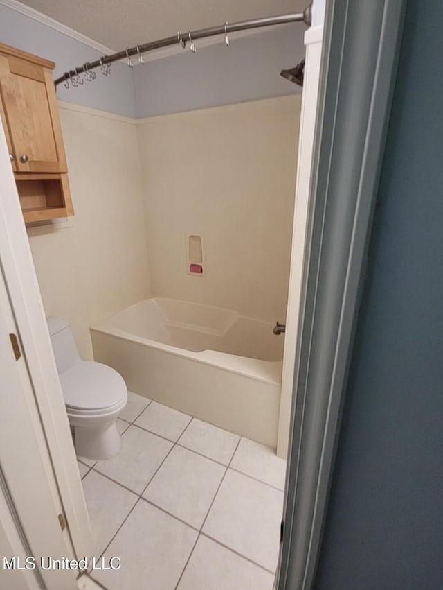1704 Pat Dr, Gautier, MS 39553 - bathroom with shower / bathtub combination, toilet, a textured ceiling, and tile patterned flooring
