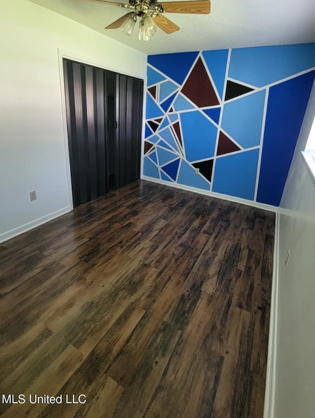 1704 Pat Dr, Gautier, MS 39553 - unfurnished room with baseboards, ceiling fan, and wood finished floors