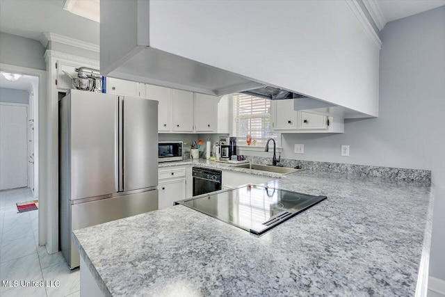 kitchen featuring crown molding, black appliances, a sink, and white cabinetry