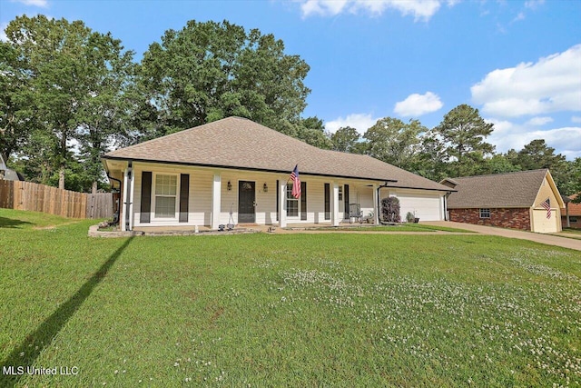 view of front of property with fence, an attached garage, a front lawn, covered porch, and driveway