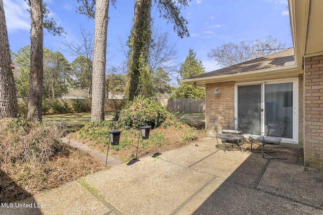 view of patio / terrace with fence