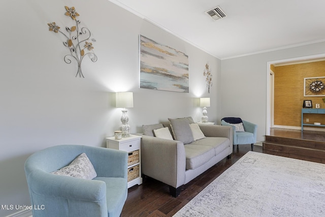 living room with visible vents, dark wood-style floors, and crown molding