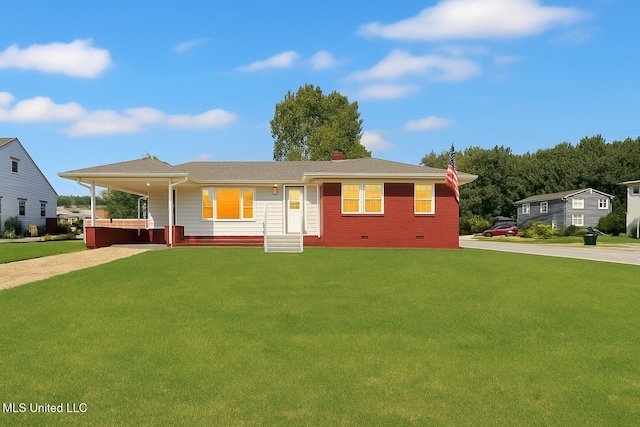 1049 Idlewild St, Memphis, TN 38107 - view of front of property with driveway, a front yard, brick siding, and crawl space