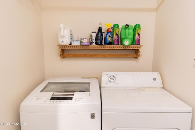 laundry area with washer and clothes dryer